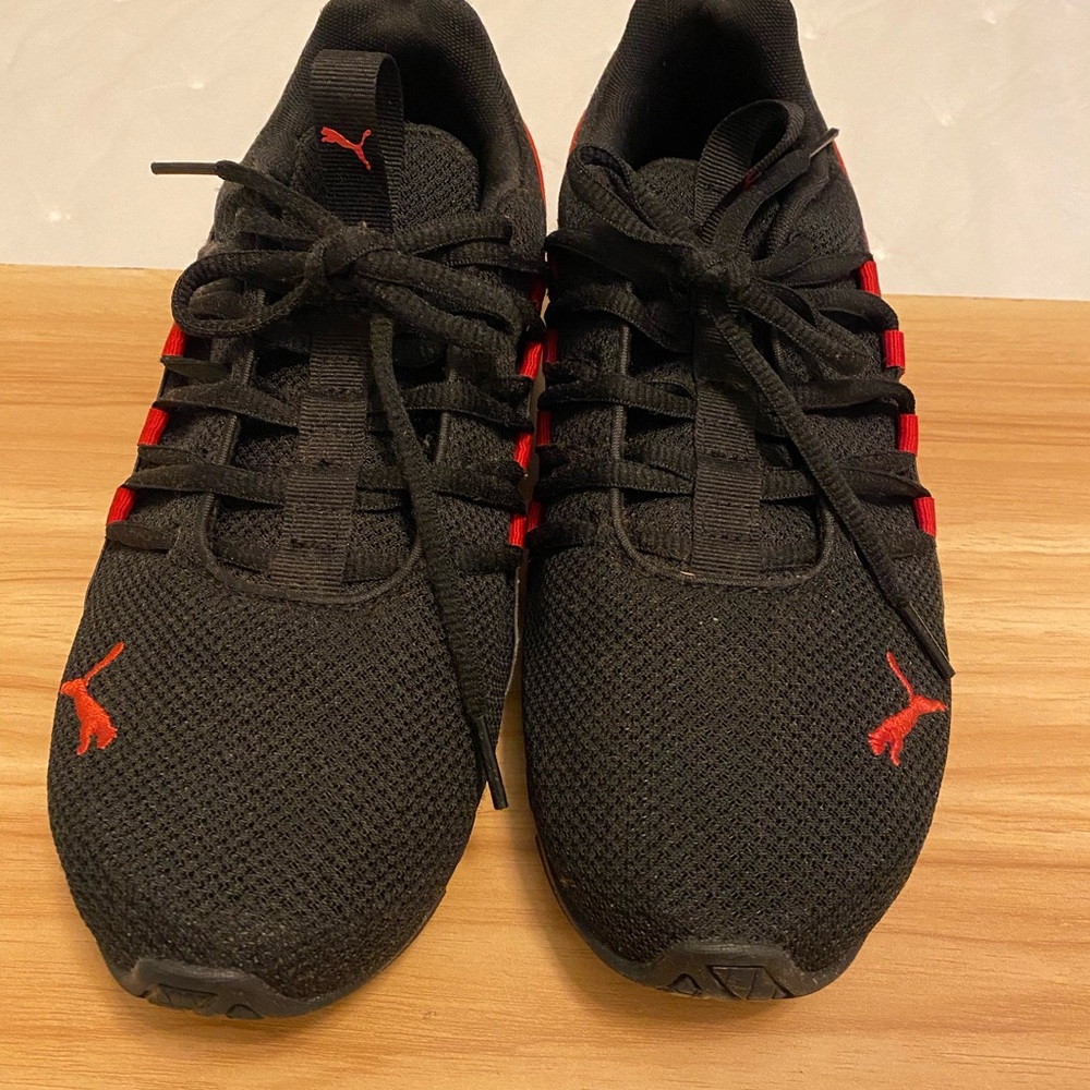 Boys size 7 Black and Red Puma shoes.